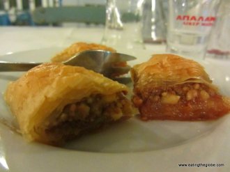 Complimentary baklava with raki at Akrogiali Taverna Restaurant in Crete