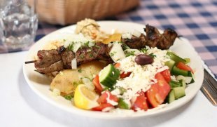 Souvlaki meal with side dishes